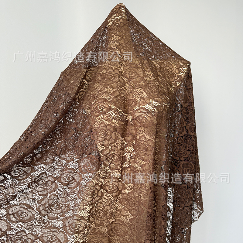Tejido de encaje elástico de poliamonio 2026 tela de ropa de mujer para hacer falda, vestido, blusa, tela