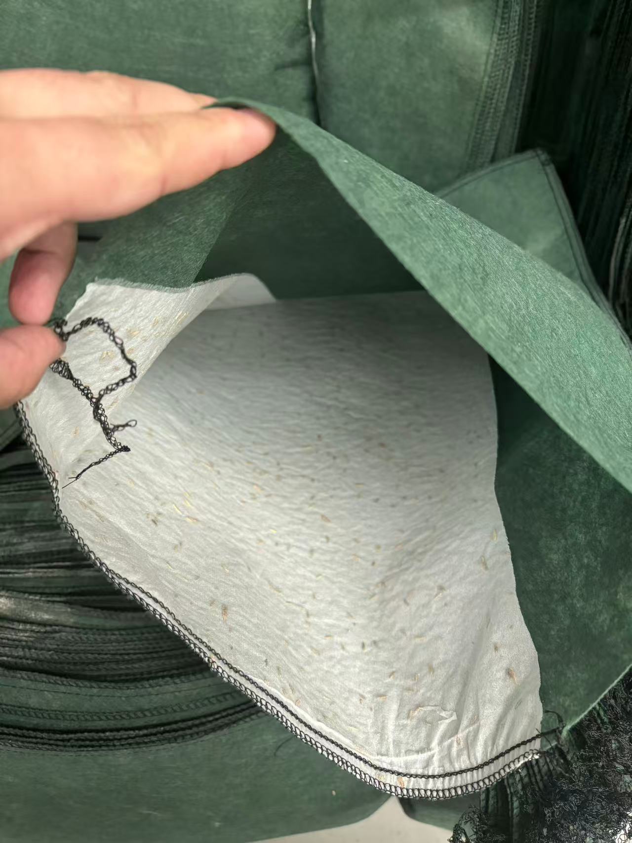 Bolsa ecológica de filamento corto de semilla de hierba verde, bolsa de vegetación para protección de pendientes resistentes al envejecimiento y protección ambiental de diques de río
