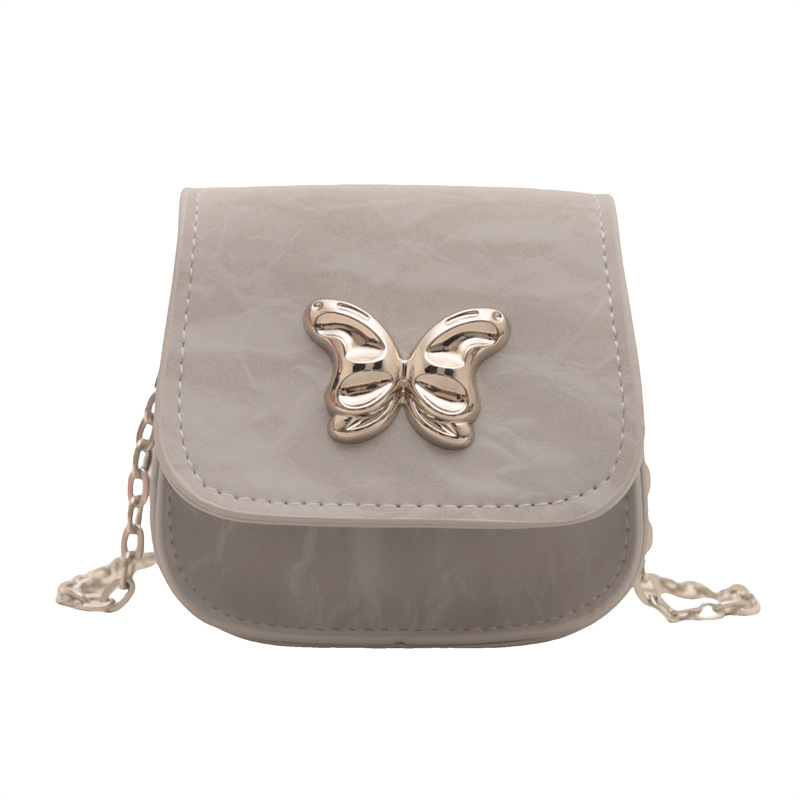Mariposa de personalidad estética francesa 2024 otoño nuevo color sólido casual moda cadena mensajero hombro pequeño bolso cuadrado mujer