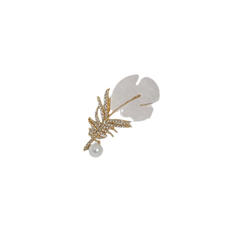 De gama alta exquisita pluma broche exquisito traje abrigo ramillete accesorios luz de las mujeres de lujo de gama alta pin anti-exposición hebilla pin