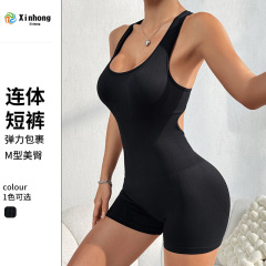 クロスボーダーの新型ヨガ服夏の背中の透かし彫りの一体式の連体服はシームレスに痩せています。