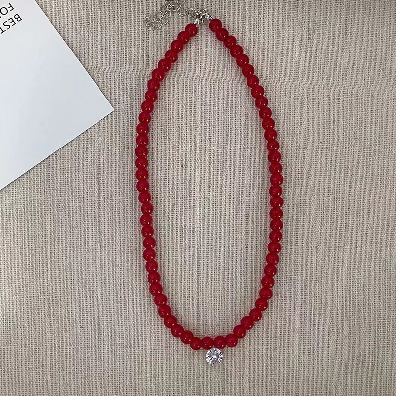 Fashionable coral red beaded bracelet