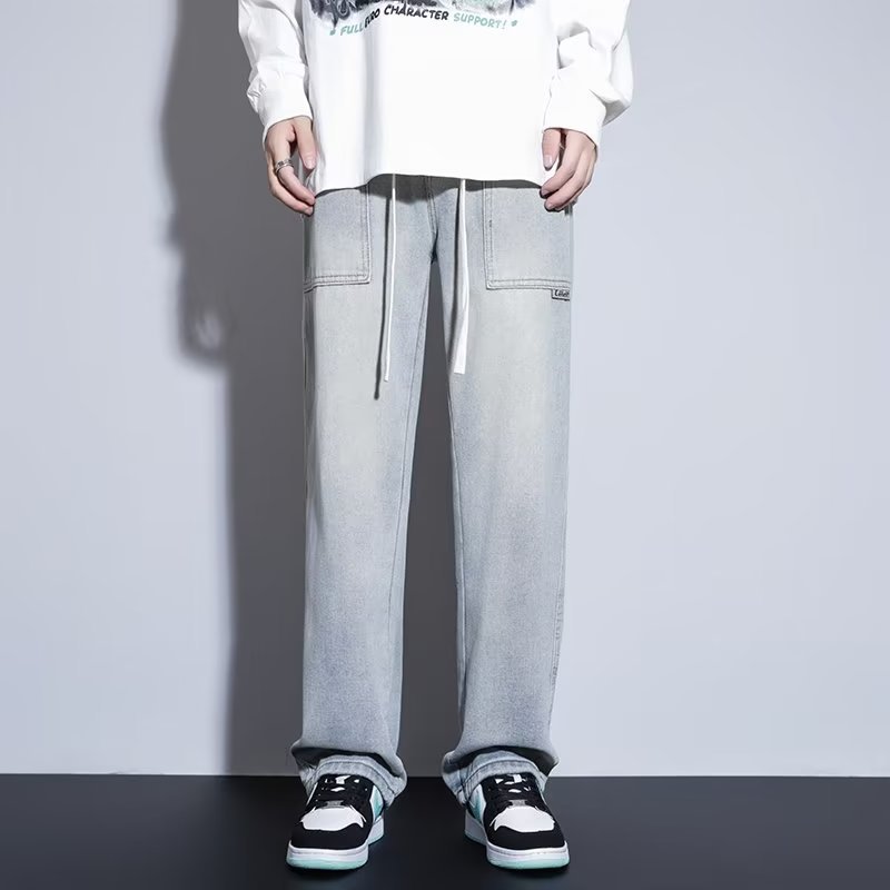 Pantalones casuales de primavera y otoño para hombres, estilo suelto de Hong Kong, sarga, pantalones de trapeador de pierna ancha de arte de moda, jeans deportivos