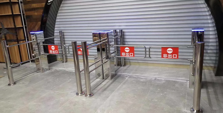 尼高迈供应自动感应导向禁行器 超市入口闸机 人行通道摆闸三杆闸