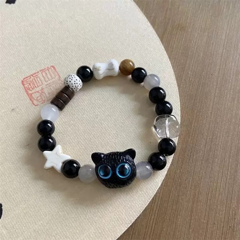 Esqueleto gato brazalete de cuerda trenzada nicho femenino diseño dulce y fresco chino ventanilla brazalete de color joyería