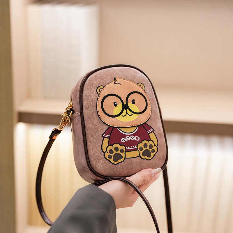 2025 nuevo oso de dibujos animados bolso de teléfono móvil de moda femenina versátil bolso de hombro adorable mini bolso vertical