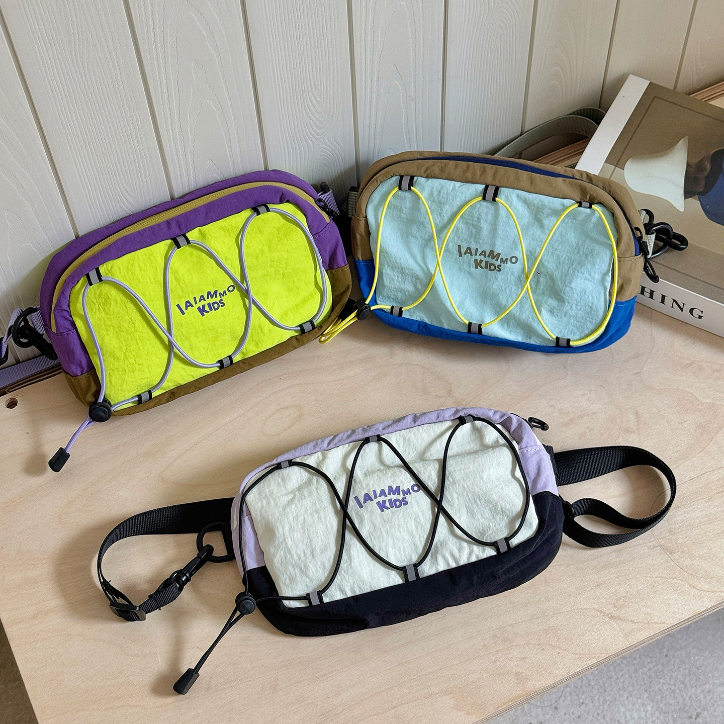 Mochila de hombro para niños con letras frescas, bolso de mano pequeño y ligero, 2026 nuevo bolso de cambio para niños