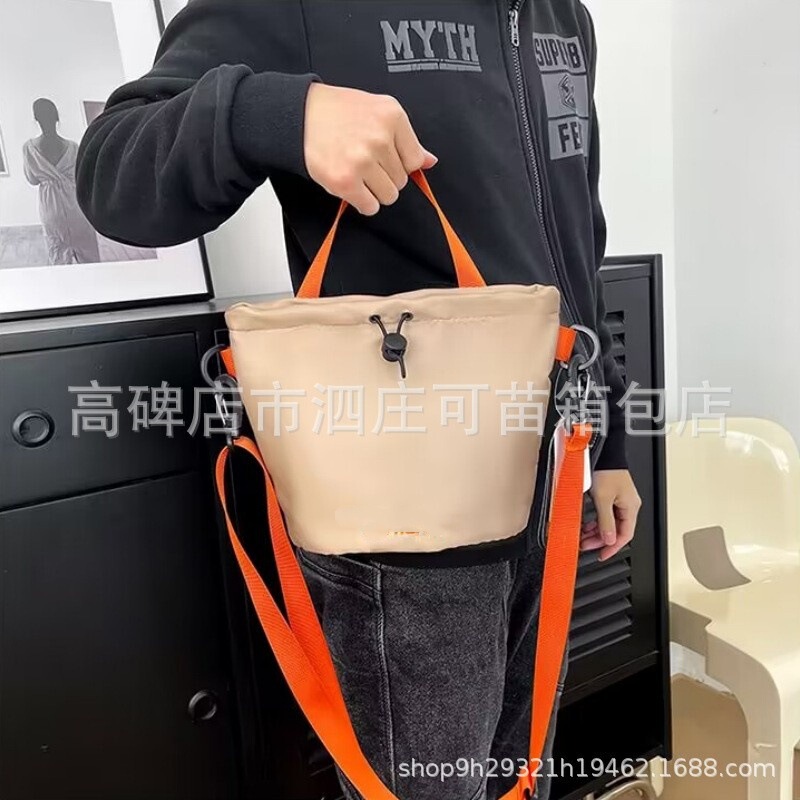 Carhartt Simple and Versatile Large-Capacity Portable Bucket Shoulder Bag 2026 Trendy Brand Casual Waterproof Crossbody Bag for Men and Women