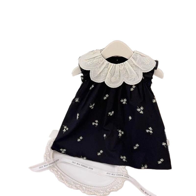 Xianning siete ropa para niños coreanos verano nuevo estilo bordado cuello de hoja de loto vestido floral negro falda chaleco sin mangas para niñas