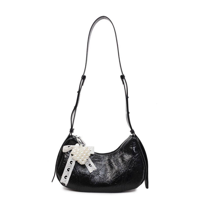 Bolso de axila de textura de alta calidad 2025 verano nuevo bolso femenino moda patrón de agarre de mano bolso bandolera con letras extranjeras