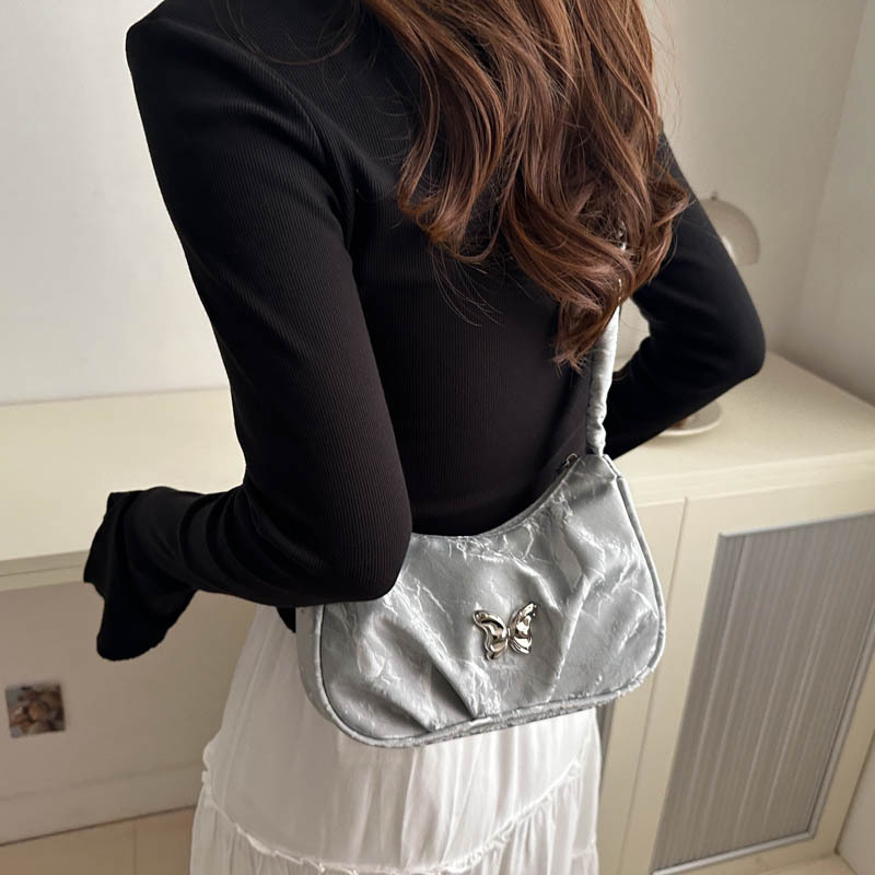 Bolso de nicho súper caliente para mujer 2024 nuevo bolso de mensajero popular de todo fósforo bolso de axila de hombro plisado de moda de alta gama