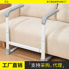 手すりの手すりの老人は穴を開けないでソファーの便器のベッドの上で安全に立ち上がります。