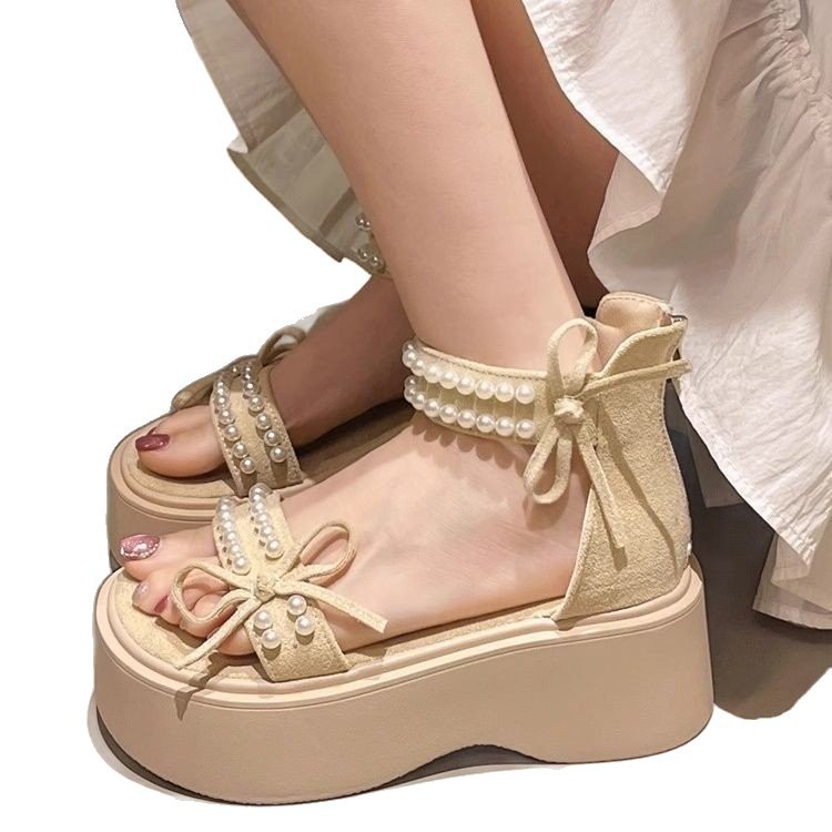 Arco de perlas sandalias de fondo grueso de hadas 2026 primavera y verano nuevo estilo con falda de sandalias romanas de moda