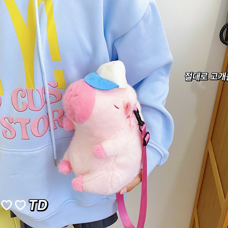 Kapibara muñeca de peluche de dibujos animados bolsas de agua de hombro conejillo de indias para chicas regalos transfronterizos bolsas de animales