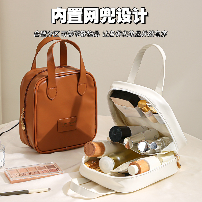 Nueva bolsa de maquillaje de viaje PU para mujeres productos de cuidado de la piel bolsa de maquillaje de almacenamiento de gran capacidad portátil bolsa de maquillaje portátil
