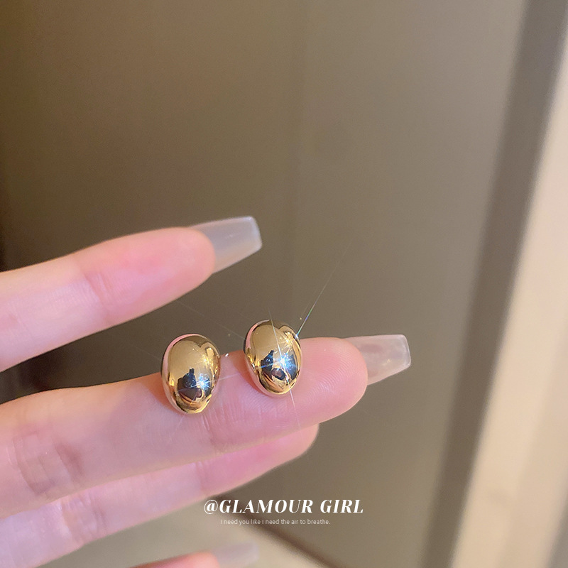 Oro real electrochapado aguja de plata simple ins pendientes estilo frío nicho pendientes de alto grado de cercanías pendientes de moda versátiles