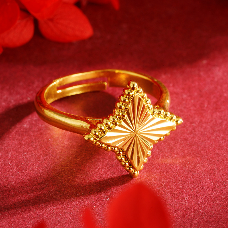 Vietnam oro de arena flores de cuatro estrellas anillo de estriado de ajuste de boca viva dama temperamento de mar China fábrica de viento mayorista