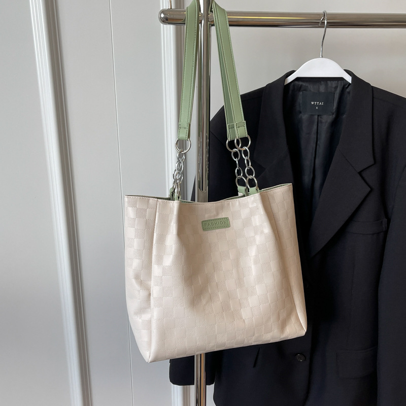 Bolsa de hombro a cuadrillas de alto nivel 2024, nueva bolsa de viaje simple de gran capacidad para estudiantes universitarios.