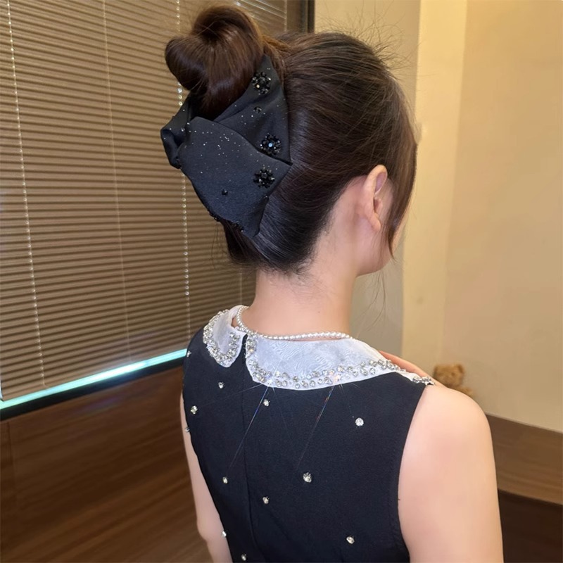 Cabeza de princesa francesa Hepburn clip de agarre de estilo femenino de alta calidad 2025 nuevo temperamento clip de cabello de arco alta cola de caballo adornamiento de cabello