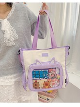 新款单肩女包时尚大容量学生包可爱猫咪印花痛包透明学生收纳袋