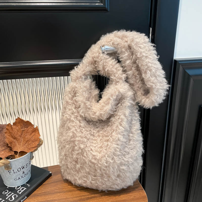 Nicho original de otoño y invierno bolsas de peluche vagabundos bolsas de hombro de chicas calientes de aire exterior rizado retro bolsas de moda