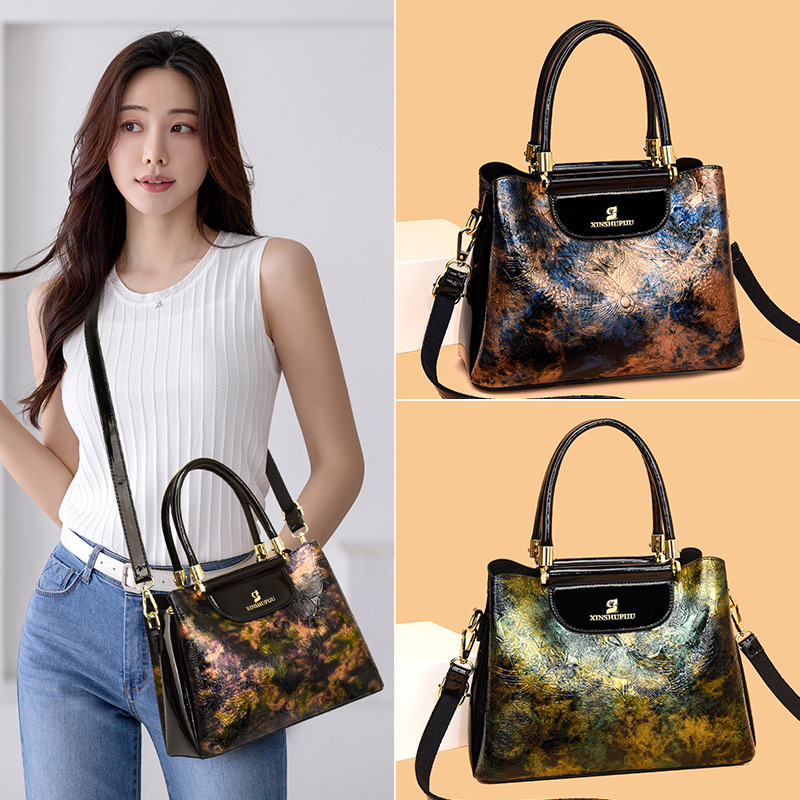 Bolso de hombro de mujer Europa y América retro bolso de tendencia nicho diseño universal temperamento de alta sensación bolso de mochila