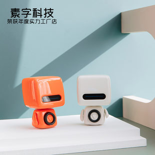 Small robot, travel speakers, bluetooth