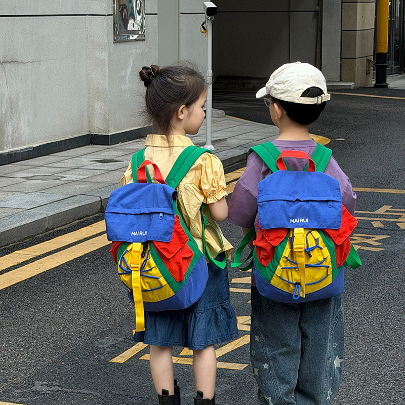 Mochila de cuerda de tracción de gran capacidad para niños y niñas, color de contraste de color, mochila escolar para estudiantes de primaria 2026 nueva mochila infantil