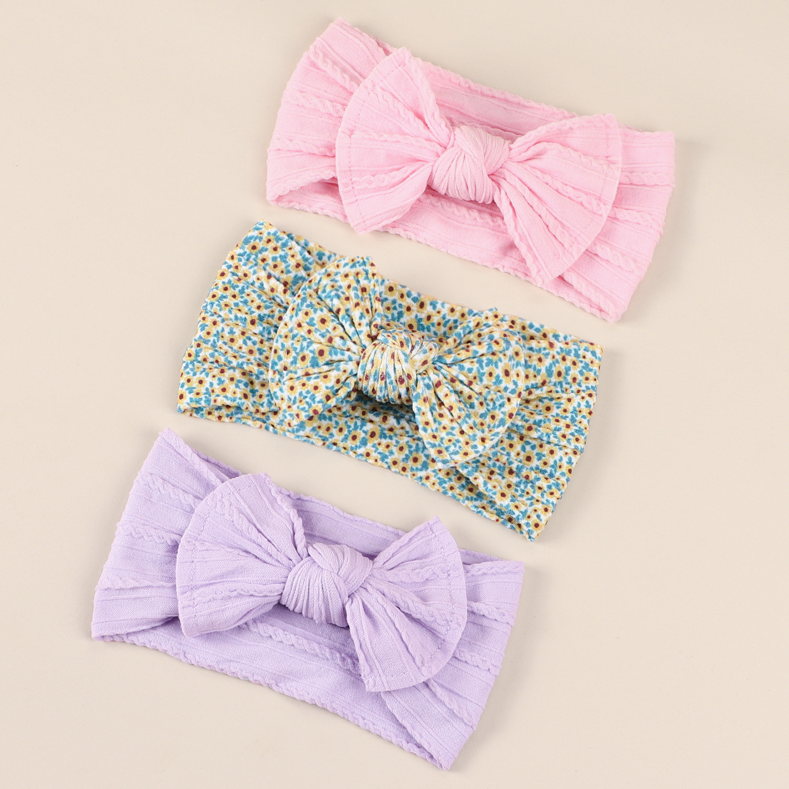 Europa y América suave Jacquard de ala ancha bowknot diadema elástica 3 piezas traje infantil halógena puerta impresa pañuelo en la cabeza de nylon