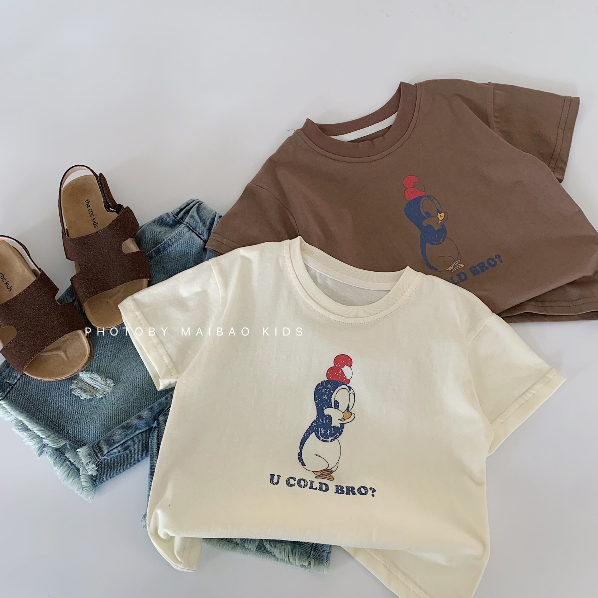 Camiseta de manga corta para niños Maibao 2025 verano nuevo estilo coreano niños y niñas tops de dibujos animados a ropa para niños al por mayor