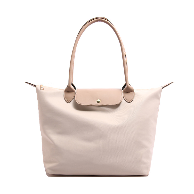 Bolso de hombro casual de gran capacidad para mujer 2025 nuevo bolso de nylon simple costura bolso portátil para axila