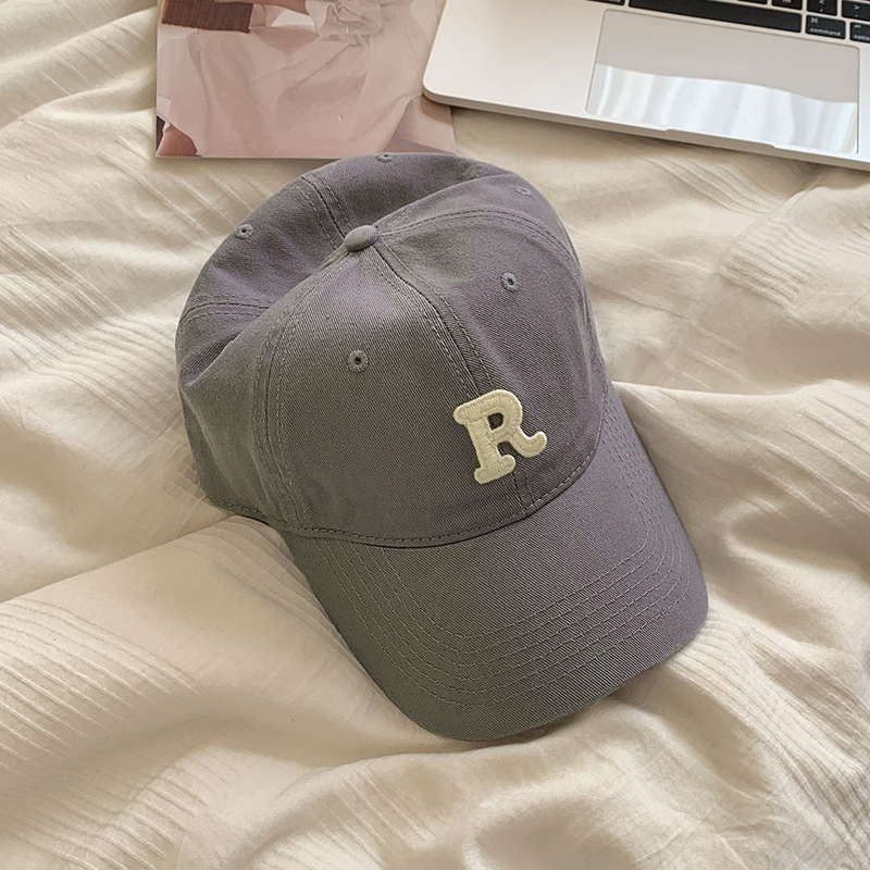 Gorra de béisbol estilo coreano circunferencia de la cabeza grande cara-mirando pequeño sombrero hombres y mujeres pareja moda todo partido letra R gorra al por mayor