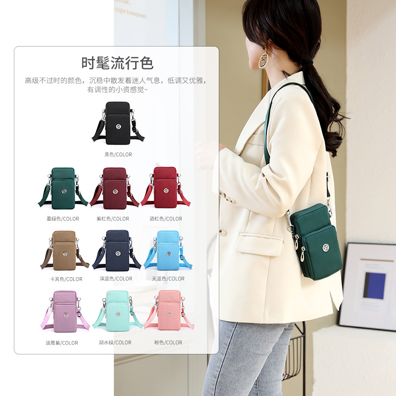 Bolsa de teléfono móvil al por mayor transfronteriza bolsa de mensajero de las mujeres Mini bolsa pequeña bolsa de muñeca bolsa de teléfono móvil Halter monedero tela