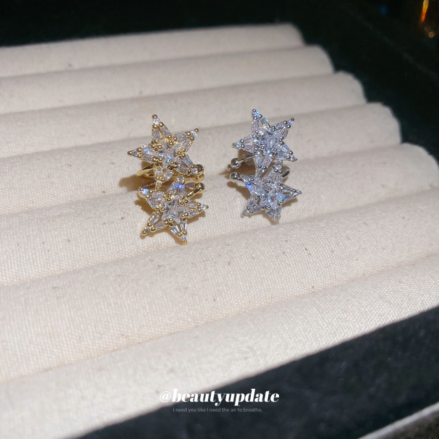 Circón estrella simple sin orejas pinzas de hueso de oreja de diseño de nicho de moda pinzas de oreja pendientes de lujo ligero pendientes de sentido avanzado mujeres