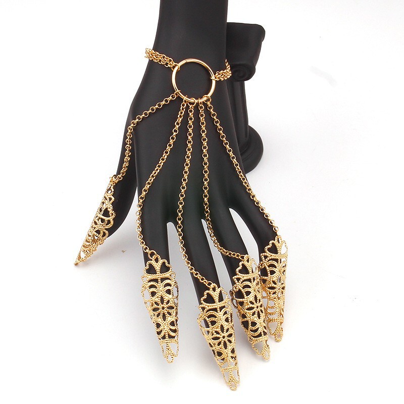 Fashion retro ethnic style hollow pattern tapered nail set bracelet personality tassel ring bracelet integrated chain Fashion retro ethnic style hollow pattern tapered nail set bracelet personality tassel ring bracelet integrated chain