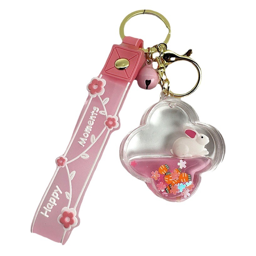 Colgante de llavero de conejo de botella de arena rosa, muñeca flotante creativa, decoración de mochila para niña, regalo exquisito para pareja