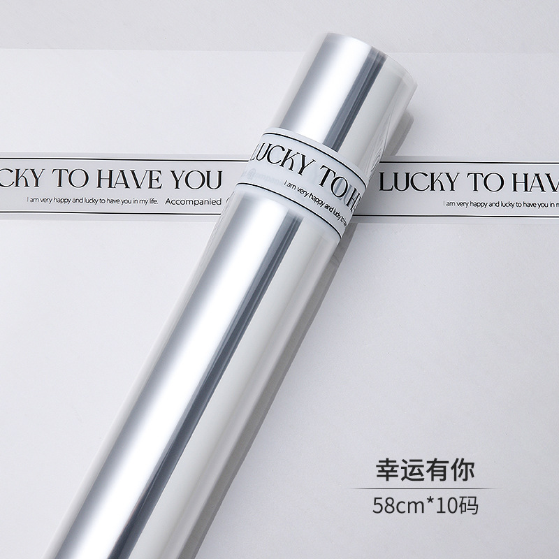 Celofán a prueba de polvo al por mayor opp forro de plástico de papel de embalaje de flores paquete de ramo celofán transparente en stock