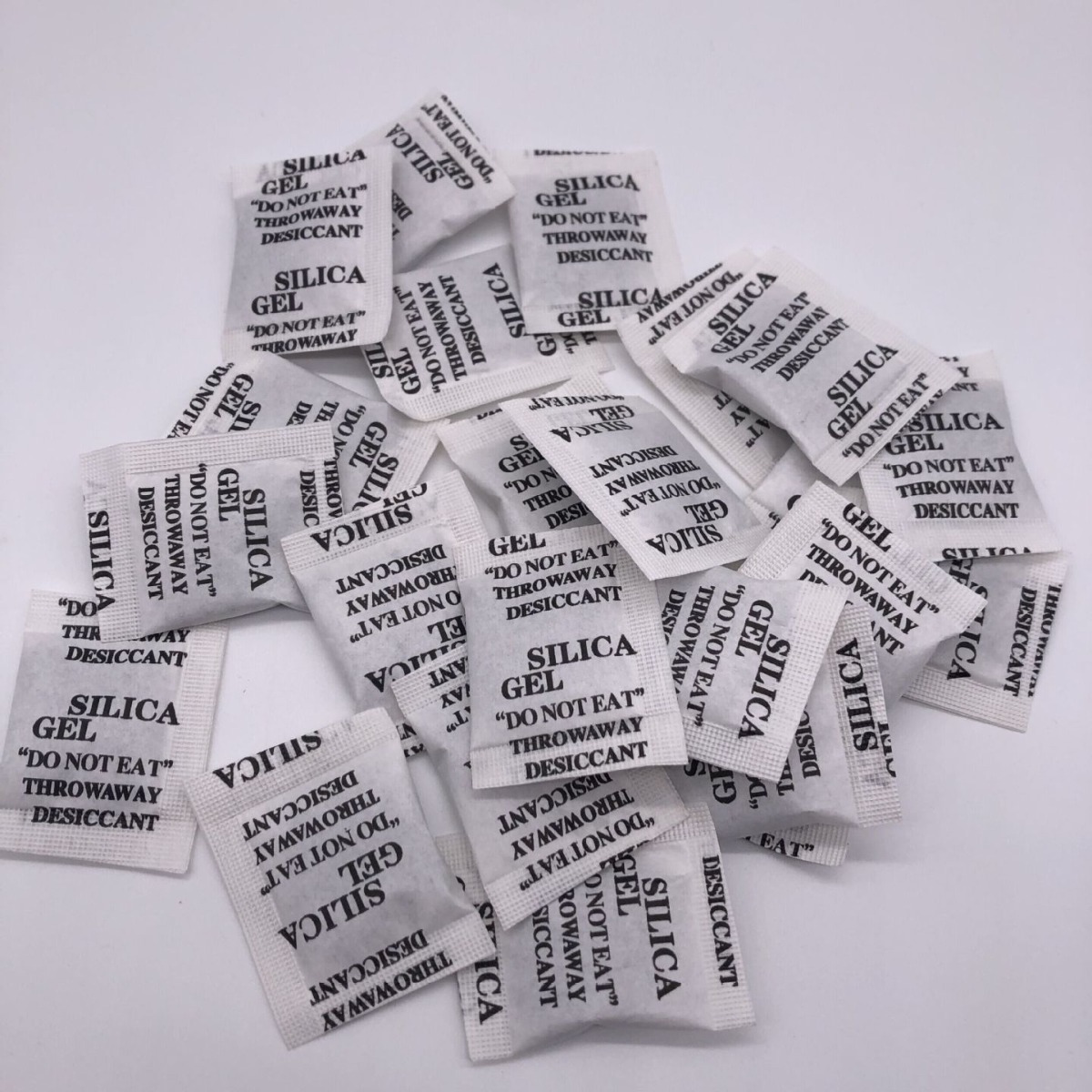 1 g 2 g 3 g 5 g desecante mineral gránulo gris compuesto de papel artesanal adsorbente de olor