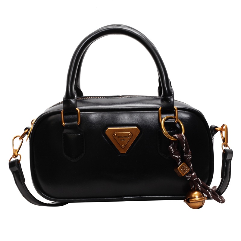 Bolsa de bolos retrógrada de mano para mujeres 2024 nuevo diseño de viaje universal bolso de hombro de nicho de alta calidad bolso pequeño