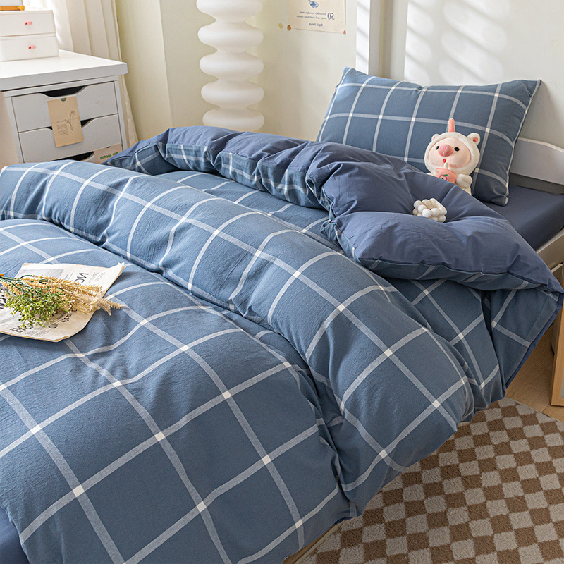 Verano dormitorio universitario conjunto de algodón de tres piezas 2025 nuevo estilo funda de edredón de algodón sábana cama de cuatro piezas ropa de cama