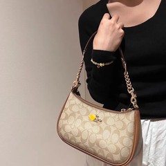 新しいcoacカルダモンの女性バッグTeri腋の下バッグの高級な軽豪華なシングルバッグのショルダーバッグのファッションバッグ