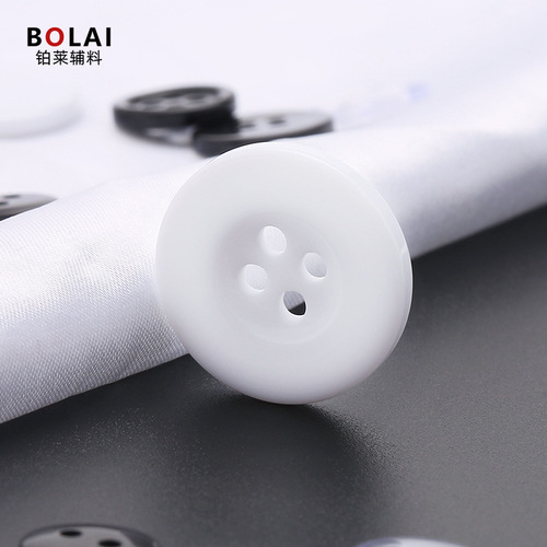 Wholesale resin suit jacket buttons, two-eye wide edge thin edge trench coat coat buttons, black round hand-sewn buttons