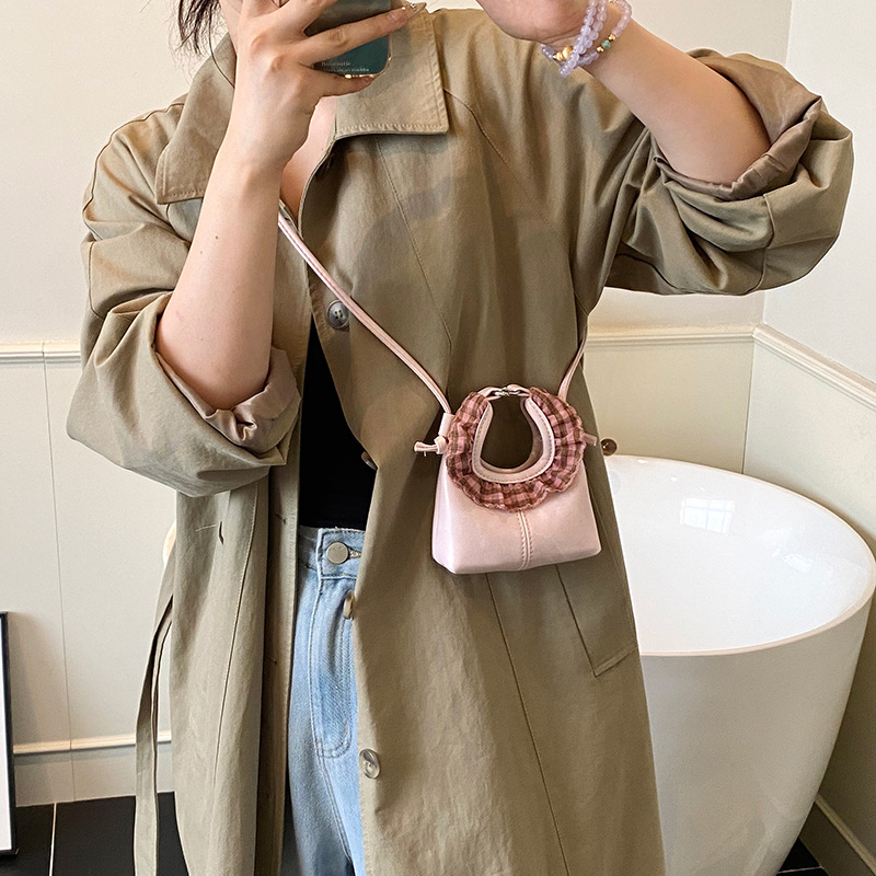 2025 otoño / invierno nuevo bolso infantil lindos bolsos de bebé de encaje redondo bolsos de mano mini niños de color sólido