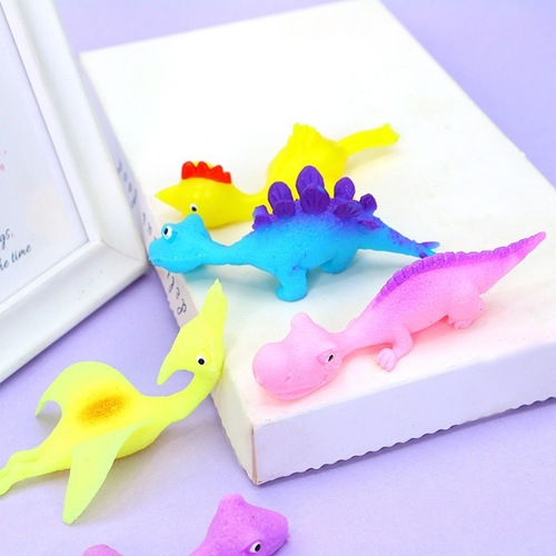 Cross-border spring dinosaur trick toy, fun and unique finger launch slingshot turkey stress relief street vendor toy