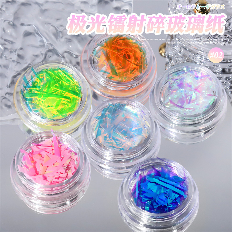 Arte de uñas Aurora duende fragmentos celofán irregular láser japonés Internet celebridad pegatinas Corte libre de uñas al por mayor