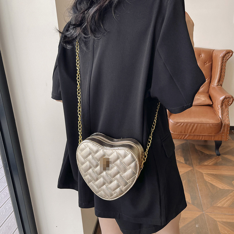Bolso de hombro transfronterizo para mujer nueva tendencia bolso de corazón de alta gama patrón de lichi ringge bolso de mensajero de cadena de color sólido simple