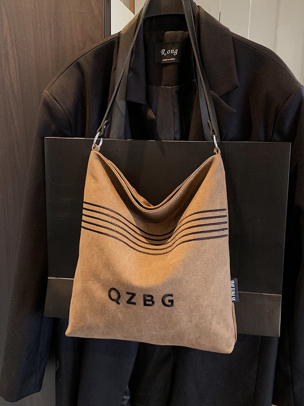 休闲百搭帆布包包女2025新款时尚通勤单肩包大学生外出托特水桶包|undefined
