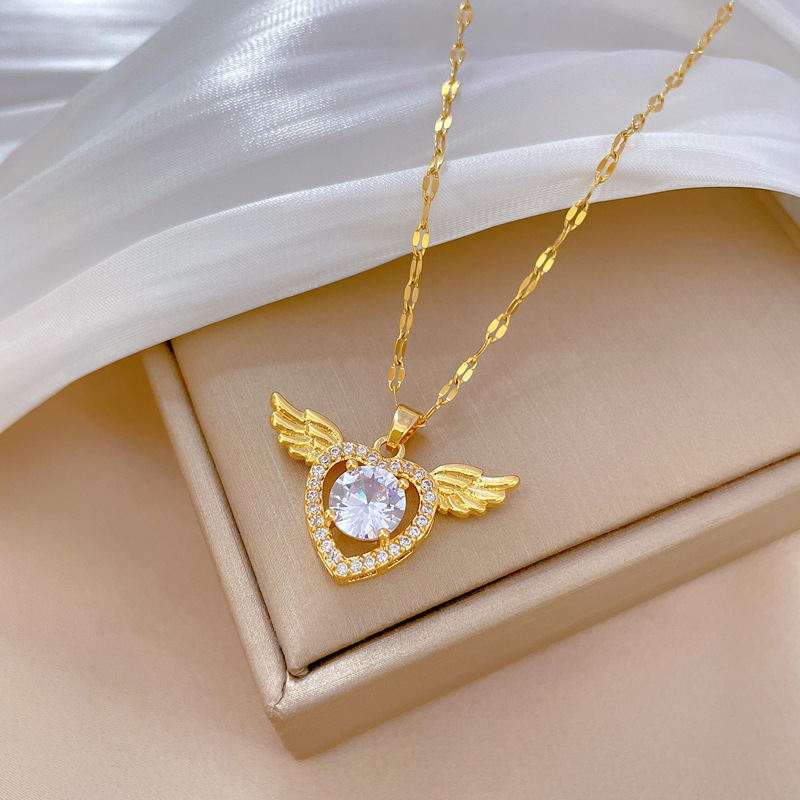 Collar de corazón con alas en acero titanio y diamantes_voghion.com