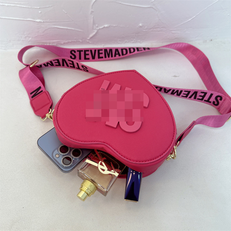 Bolso de hombro transfronterizo para mujer, sentido de alta gama, todo fósforo, letras al por mayor, bolso de mensajero simple, temperamento casual, bolso en forma de corazón