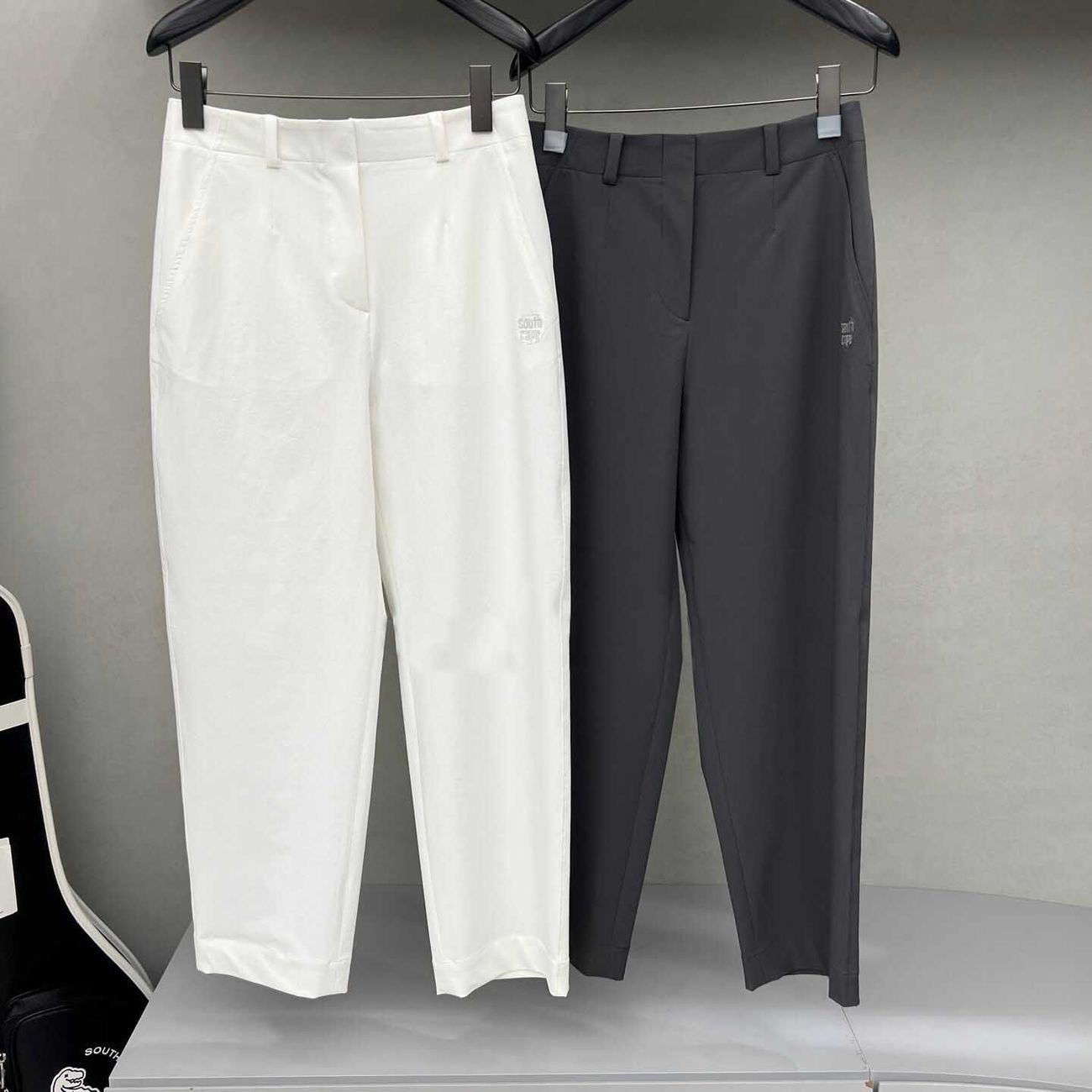 Solid color lightweight cool-touch pants with elastic back waist, simple design, anti-wrinkle fabric with good elasticity, white fabric is non-transparent